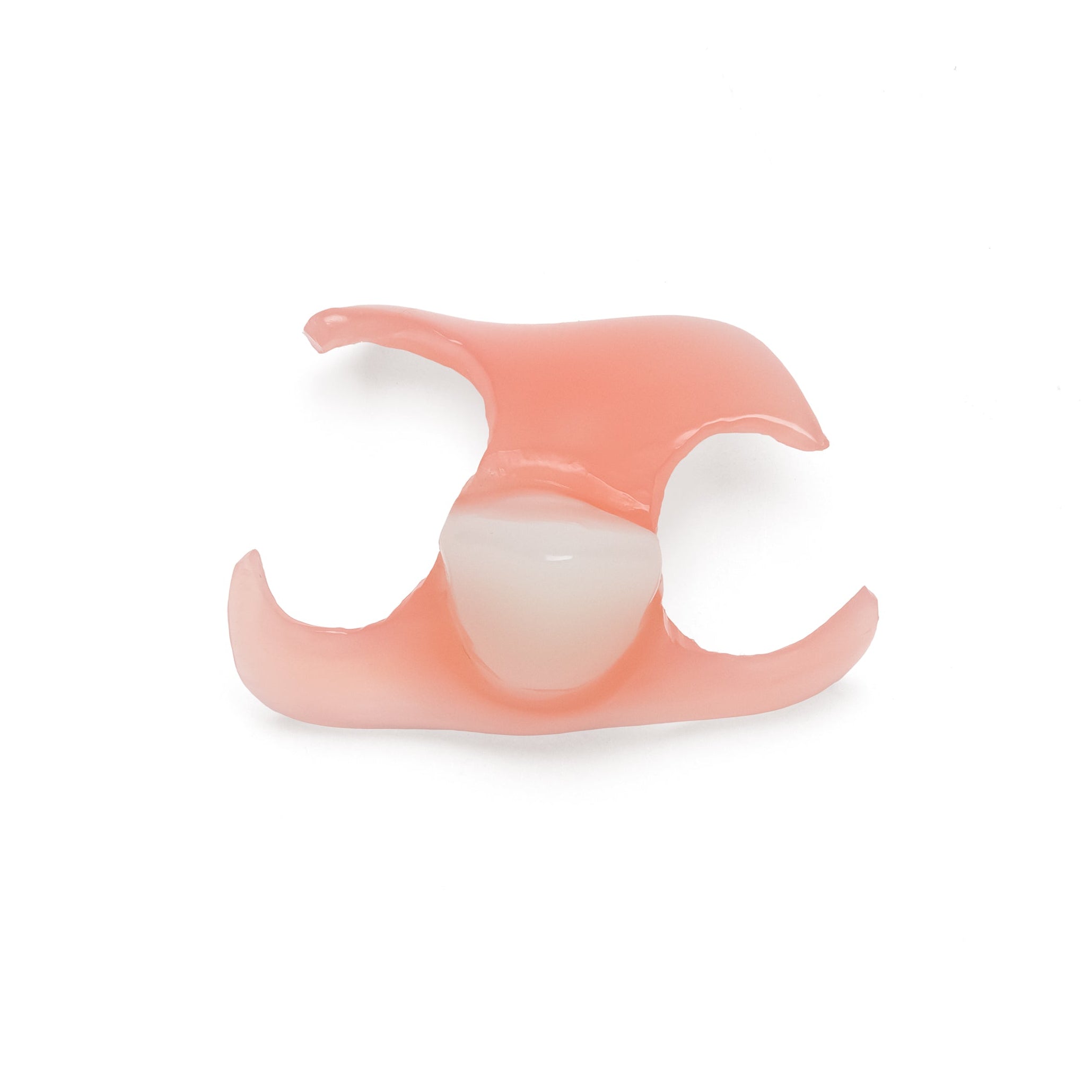 Single anterior front tooth flexible partial denture on white background.